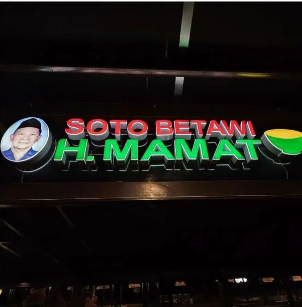 Soto Betawi H. Mamat lit sign above a counter